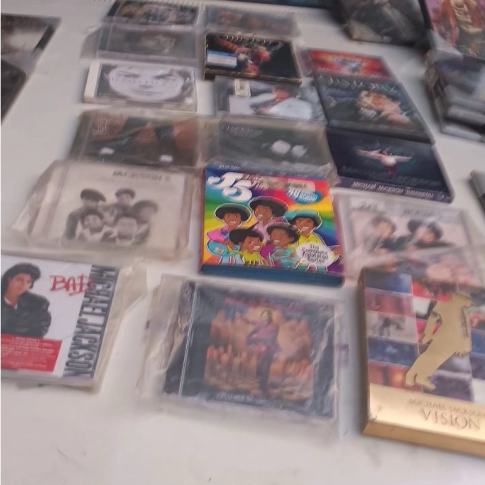 MJ collectors I have a sweet deal for these mint condition original albums/dvds